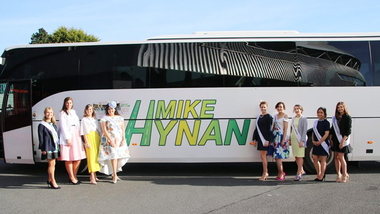 Hen Party standing in front of Hynans coach